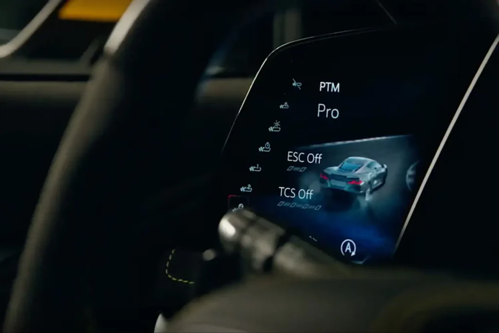 2026 Corvette ZR1X interior featuring the 14-inch digital instrument cluster, 12.7-inch infotainment screen, and 6.6-inch PTM Pro auxiliary display.